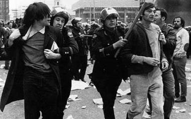 Howard Zinn. Zinn, right, being arrested at an anti-Vietnam war demonstration in the 1960s